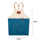 Two-tone denim apron with tan bib and blue body, front pocket, adjustable leather straps