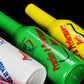 Colored plastic squeeze bottles close-up, showing caps and printed labels.