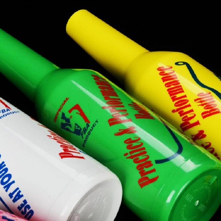Colored plastic squeeze bottles close-up, showing caps and printed labels.