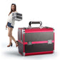 Pink and black makeup toolbox case with silver handle, secured latches, and shoulder carry