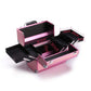 Open pink makeup and manicure toolbox with foam-lined trays and divider compartments