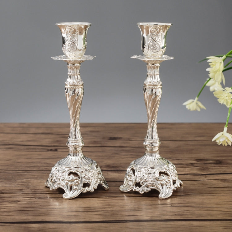 Silver two-piece candle holder set with decorative goblet tops and fluted bases
