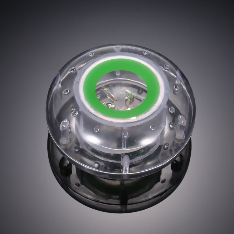 Floating LED pool lamp with clear housing and green inner light ring
