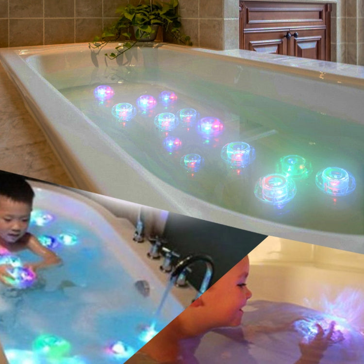 Floating LED pool lamps glowing in a bathtub, visible in the water