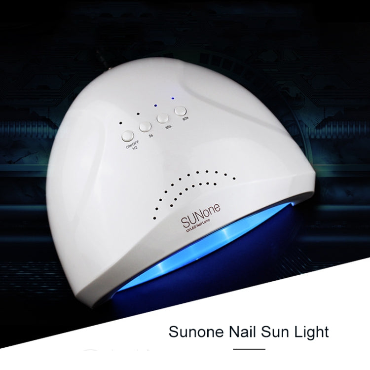White UV nail lamp with glowing blue curing window and control buttons