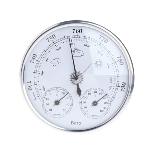 Silver round wall weather station barometer dial with cloud, sun icons and pointer