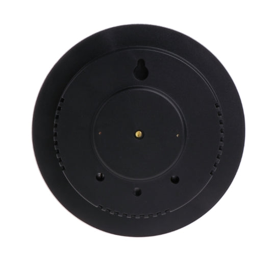Black round rear cover of wall weather station barometer with center mounting opening