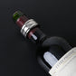 Wine bottle with stainless steel stop ring and red inner band