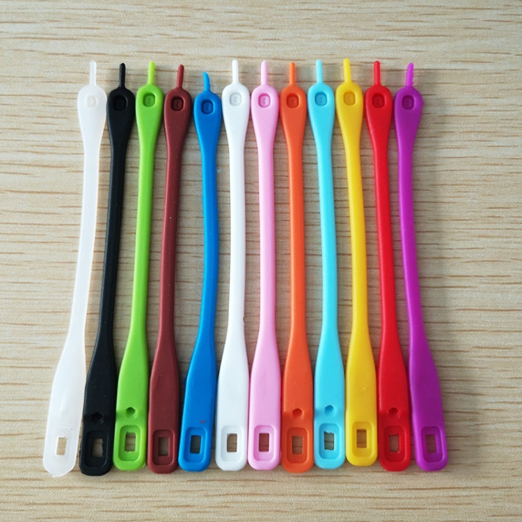 Colorful silicone wine glass markers arranged on a tray in a neat row