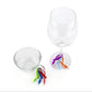 Silicone wine glass markers attached to two wine glasses with colorful bands