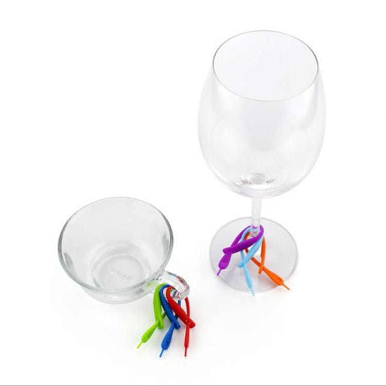 Silicone wine glass markers attached to two wine glasses with colorful bands