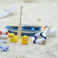Beach toy set with mini lifebuoys, boat, and animal figures