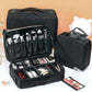 Black zippered makeup case with elastic brush pockets and palette compartment