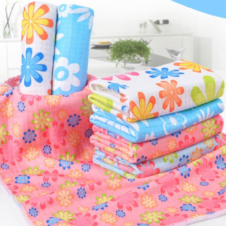 Stack of microfiber cleaning towels with blue and pink floral prints, neatly folded