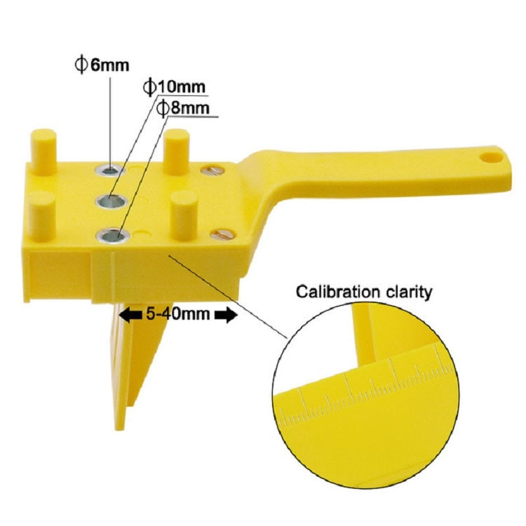 Yellow hole drilling positioner tool with marked guide positions and calibration features
