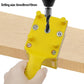 Yellow hole drilling positioner clamped on a wooden board with drill guide pins
