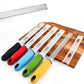 Colored-handled stainless steel graters with fine shredding teeth on a wooden organizer.