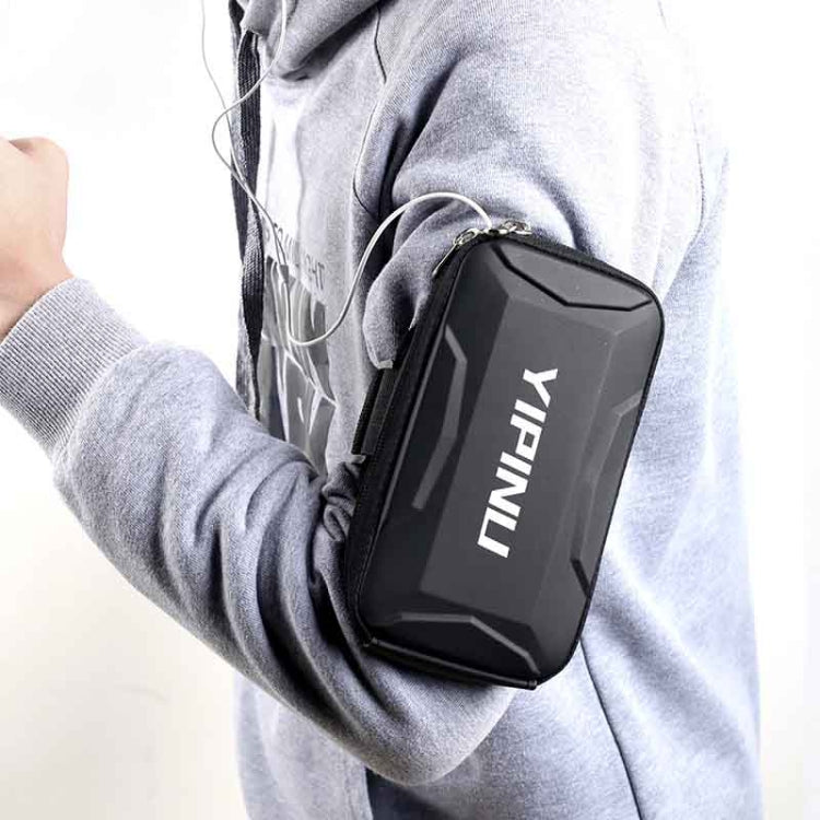 Black YIPINU armband phone pouch worn on arm, zippered rectangular case