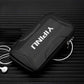 Black YIPINU armband phone pouch with zipper, angled view of protective case