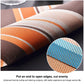 Orange and brown striped PVC placemat with close-up textured weave pattern