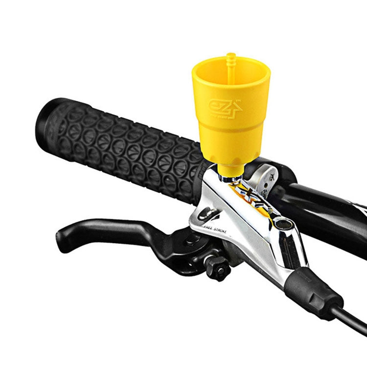 Hydraulic brake bleed tool with yellow funnel and lever-style handle