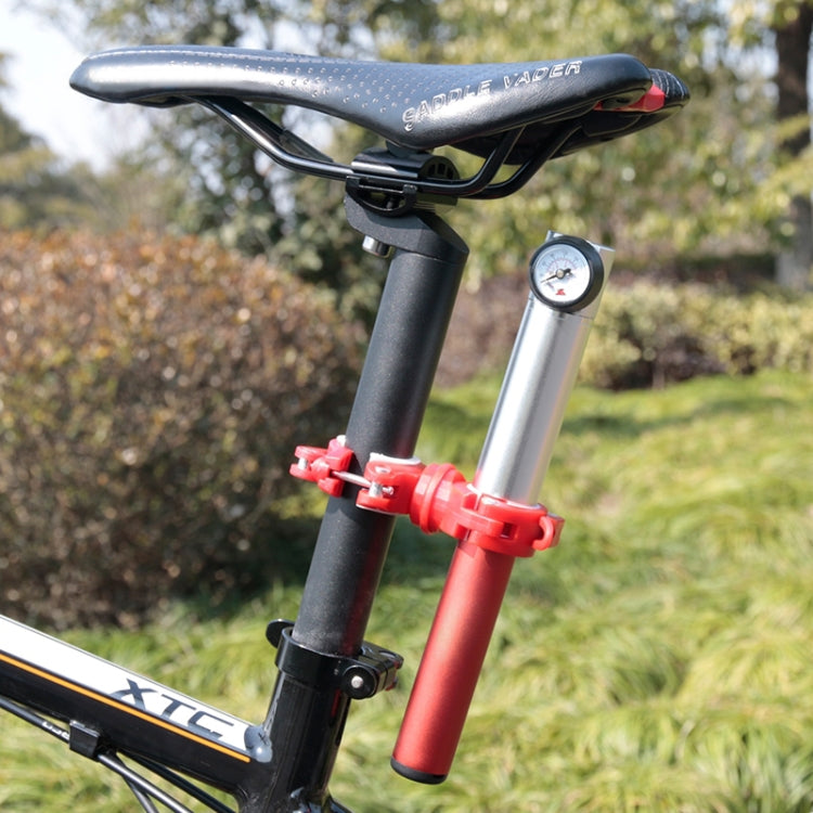 Bike-mounted flashlight clip bracket on front frame area