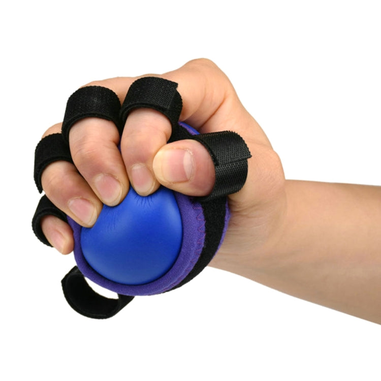 Five-finger grip rehab ball, blue center with black finger straps held in hand