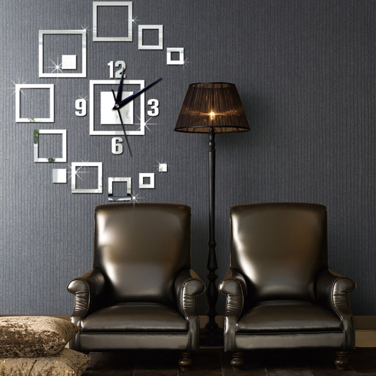 Silver square acrylic wall clock set with black hands and mirror-style frame pieces