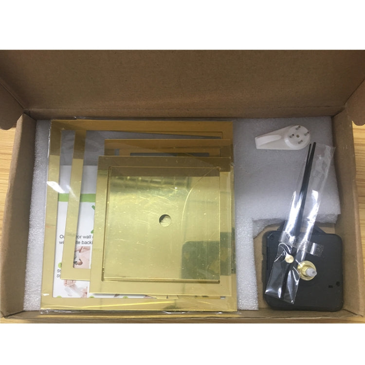 Wall clock kit in box with gold mirror acrylic pieces and clock hands accessories