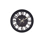 Round black quartz wall clock with decorative roman numeral ring and skeleton-style center