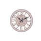 Round antique pink quartz wall clock with ornate roman numerals and light gear dial
