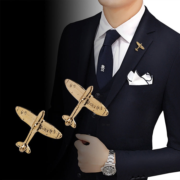 Gold retro airplane brooch set, two pins on a suit lapel