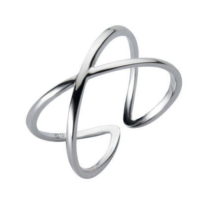 Open cross sterling-silver tone ring with smooth polished finish.