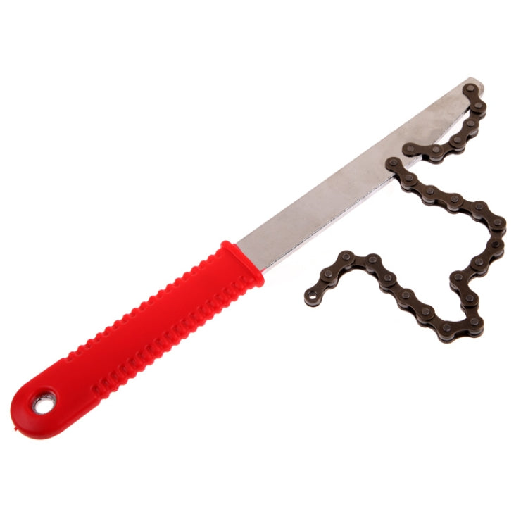 Bicycle chain repair tool with red handle and metal pry bar