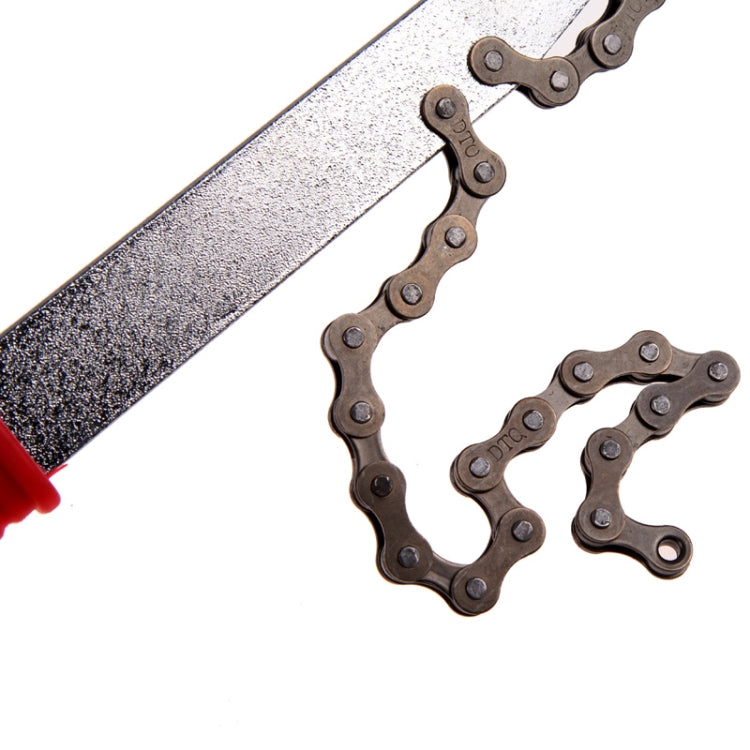 Metal blade and red grip bicycle chain repair tool with sprocket chain