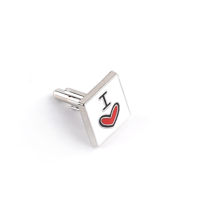 Silver-tone cuff link with “I” and a red heart icon on a square face