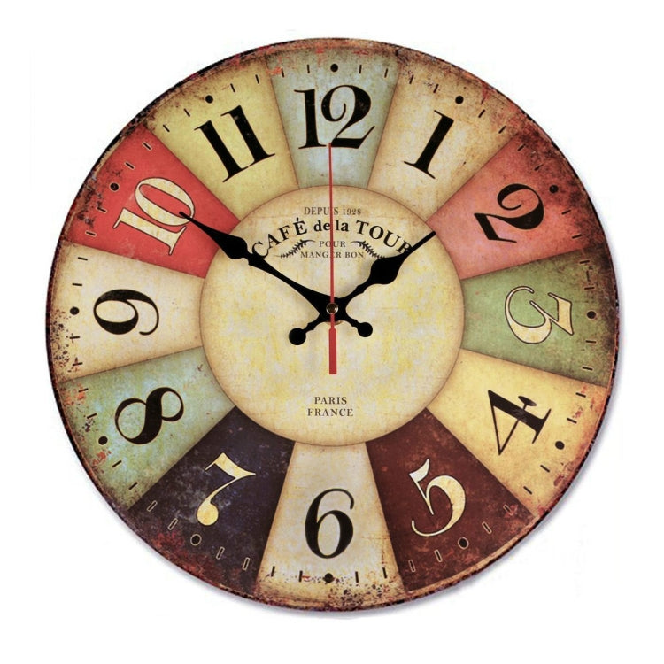 Vintage wall clock with cream center, red outer ring, black hands, Roman numeral dial.