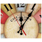 Close-up vintage wall clock dial with black and red hands over Roman numerals.