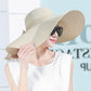 Foldable wide-brim sun hat, light cream straw with wide floppy brim and chin shade