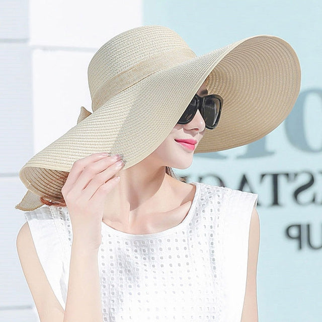 Foldable wide-brim sun hat, light cream straw with wide floppy brim and chin shade