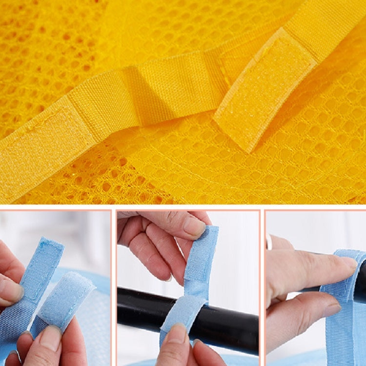 Close-up of yellow mesh basket with reinforced straps and attachment tabs