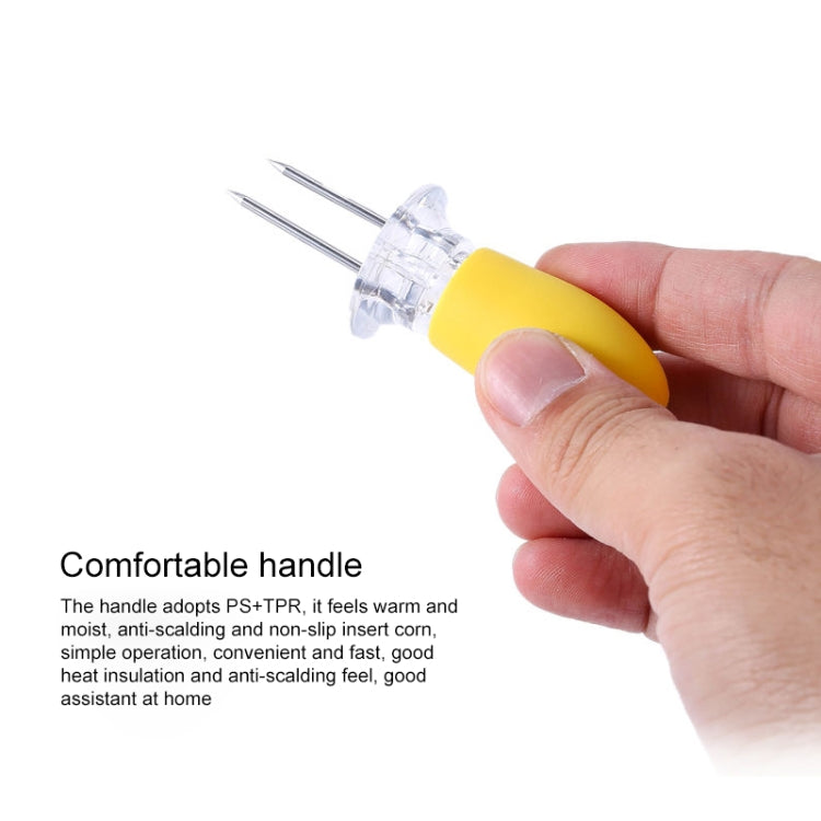 Yellow corn fork with two stainless steel tines held in a hand