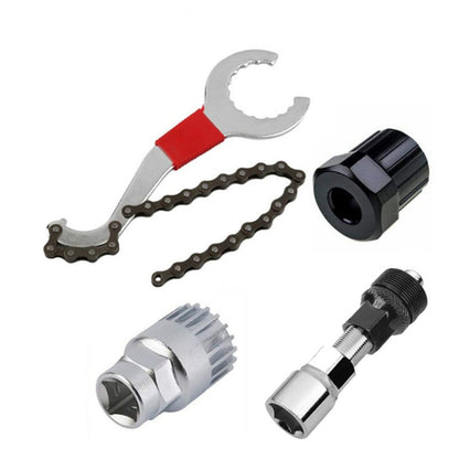 Bicycle chain wrench tool with red grip, silver wrench jaw, and chain repair links