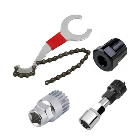 Bicycle chain wrench tool with red grip, silver wrench jaw, and chain repair links
