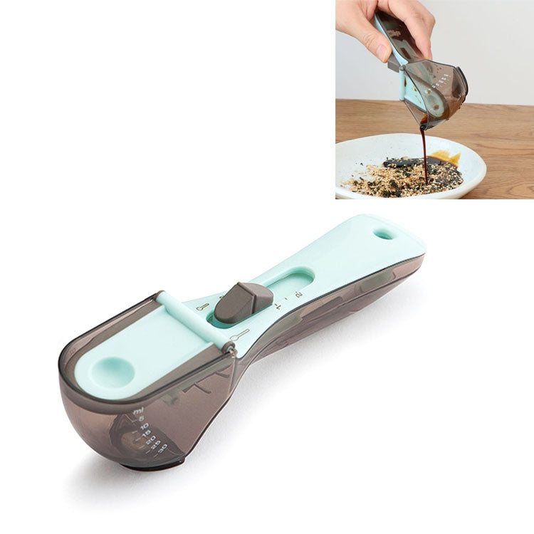 Adjustable plastic measuring spoon with light-blue handle and translucent smoky measuring cup