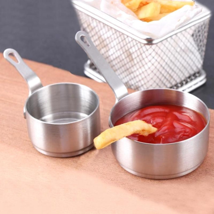 Two stainless steel mini sauce pots with loop handles for cooking