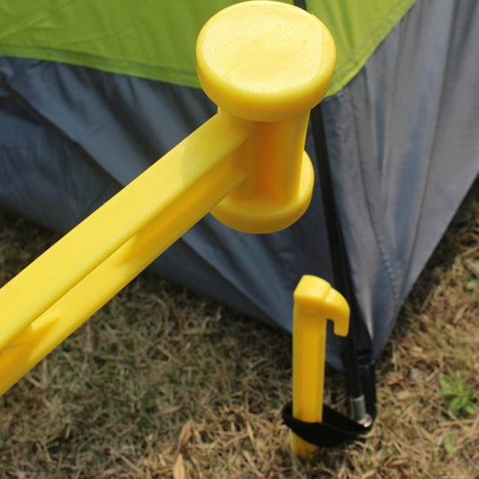 Yellow plastic tent stake hammer with rounded head and tapered handle