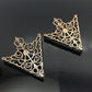 Two triangular collar buckles with crown-like filigree, antique bronze and gold tones