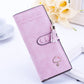 Long zip wallet in light purple with umbrella emblem and tassel zipper pull