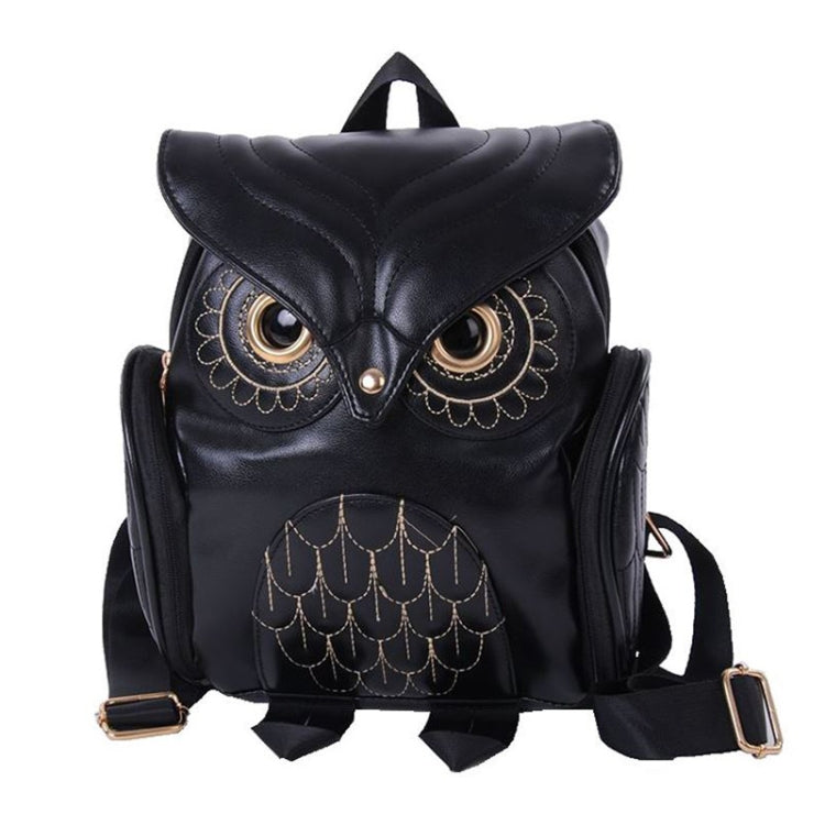 Black owl-pattern shoulder backpack with front owl eyes and side straps